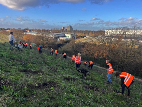 Tree planting at Glade Lane Canalside Park in Southall, London